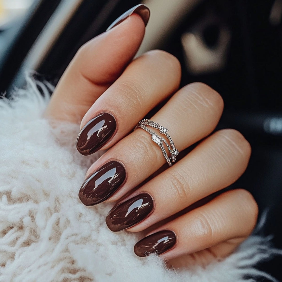 close up of brown shiny nail polish 