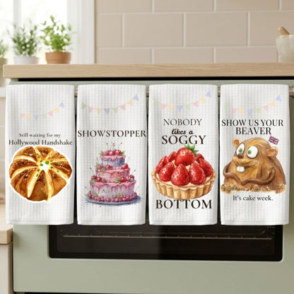 Four kitchen towels with humorous prints hanging on a kitchen cabinet.