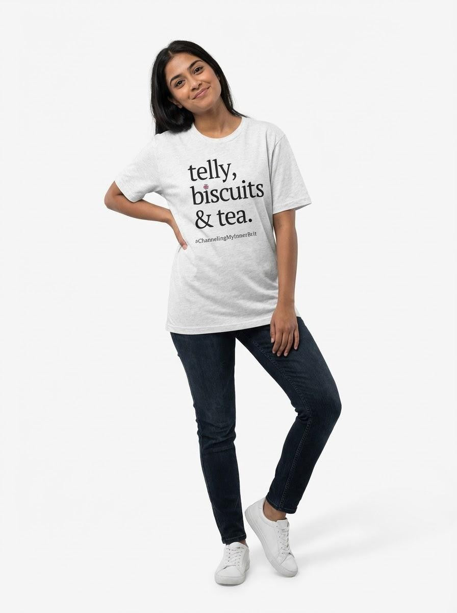 Woman wearing a white t-shirt with text saying Telly, biscuits and Tea standing against a white background