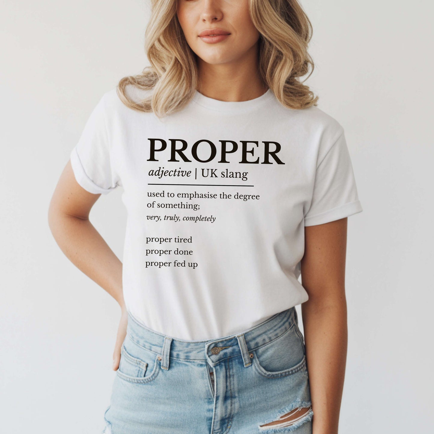 Person wearing a white t-shirt with 'PROPER' definition text on a plain background.
